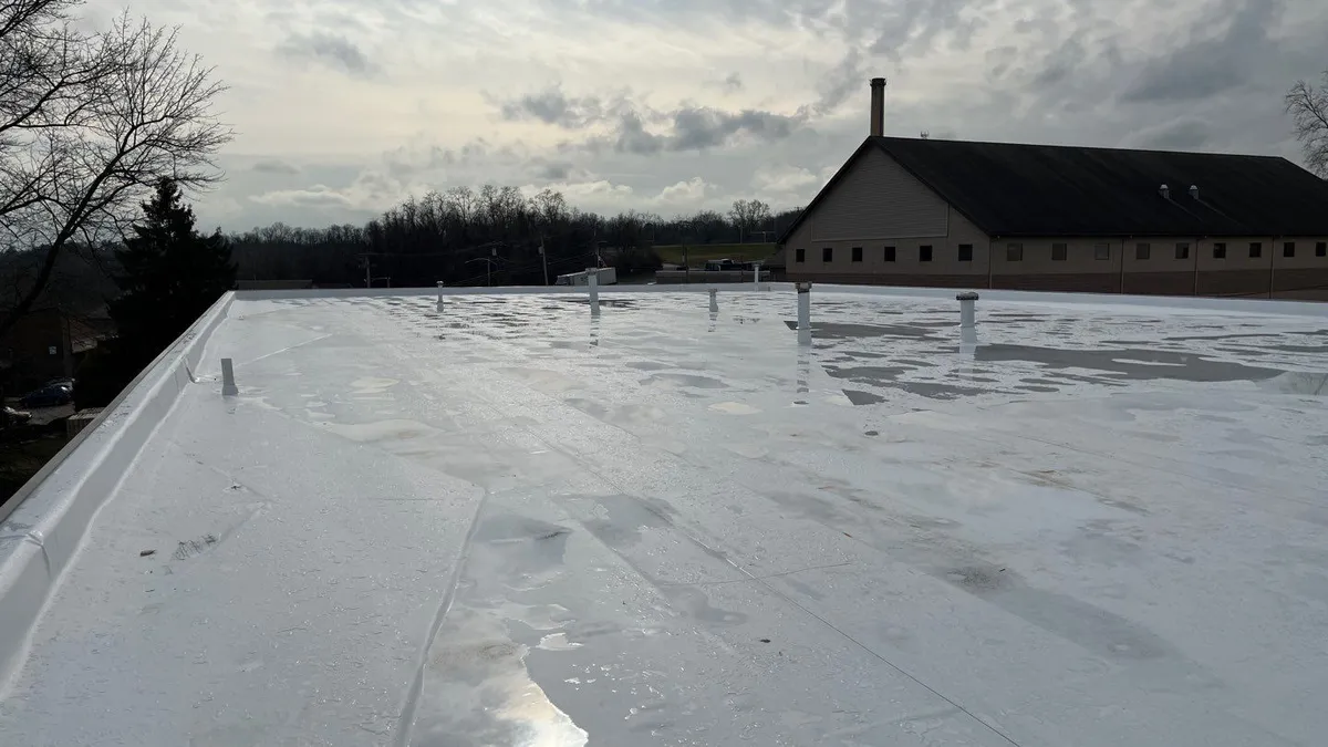 New tpo commercial roof protecting the building from rain