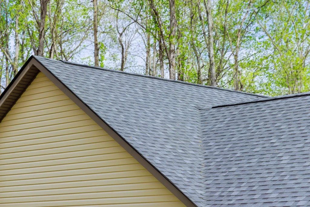 gray shingles and yellow siding