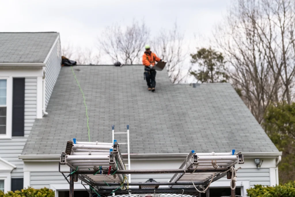 roofer walking on a roof