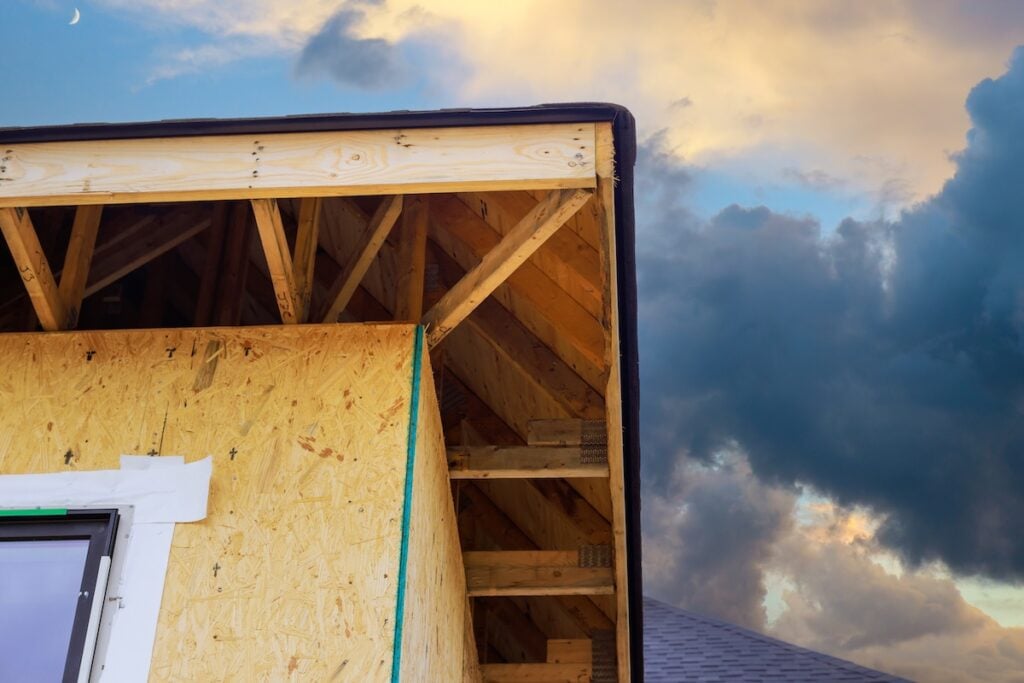 During construction of house, joist framework featuring plywood