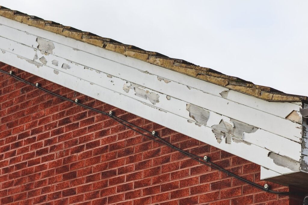 Flaking paint and chipping on house