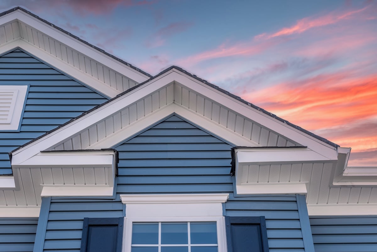 Blue house with white fascia and soffit