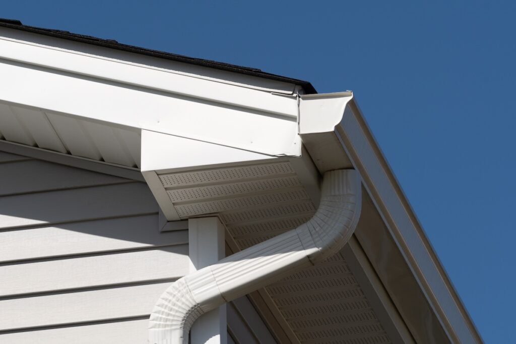 White fascia and soffit on tan house