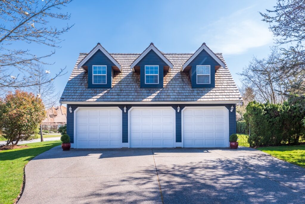 Fragment of a luxury house with a garage door 