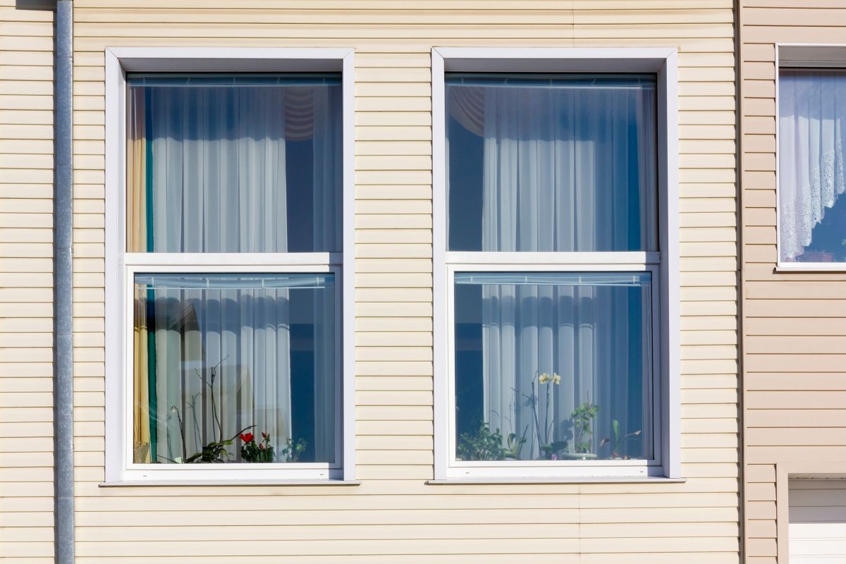 beige house with white windows